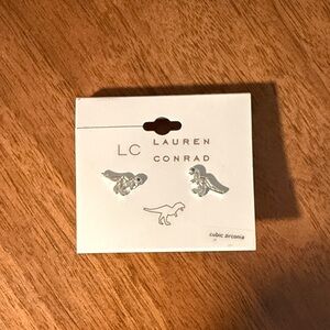 Dinosaur stud earrings